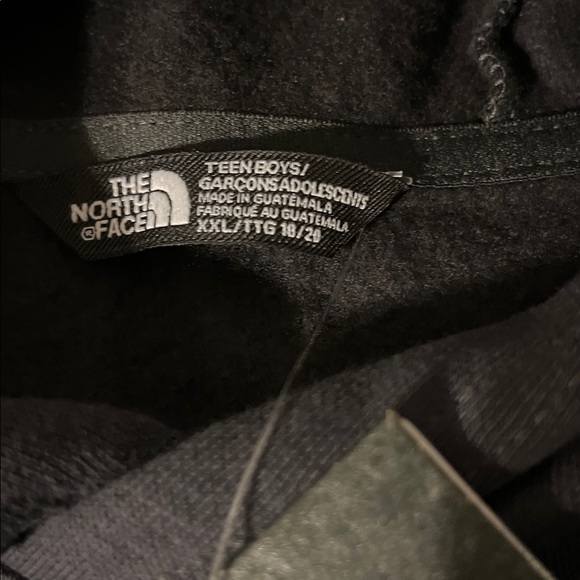 The North Face Charcoal Hoodie with Vibrant Orange Sleeve Design - Picture 2 of 14